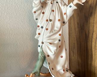 Armani clown figurines.