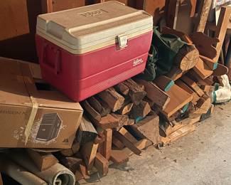 Firewood and igloo cooler