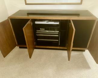Vintage stereo cabinet with side speakers and vintage Magnavox electronics 