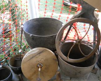 Cast iron pots,, Anvil, old stone grinding wheel