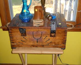 nice wood trunk, brass lamp, blue glass