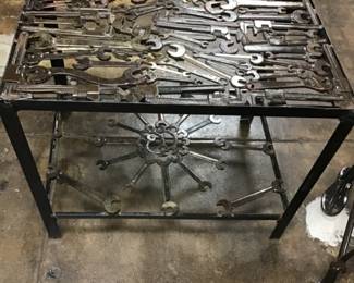 Industrial steampunk welded table made of wrenches. One-of-a-kind art piece by metal artist, Stephen C. Malone.