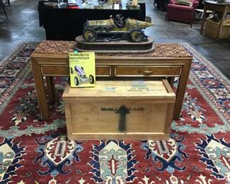 Original wooden crate and the MARMON WASP, by Stanley Wanless. Bronze sculpture of the first car to win the Indianapolis 500 in 1911. The design of this vehicle introduced the invention of the first rearview mirror to the world. Only 40 of these were made.
