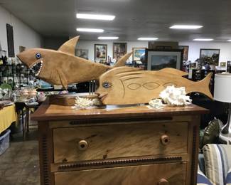 Handcrafted collection of fish. These carvings represent the creative and imaginative folk art of Will Armstrong. While all the carvings themselves are beautifully done, they come alive as whimsical and unique personalities of nature.
