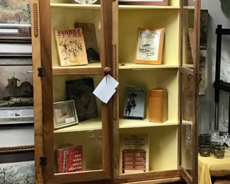 Corner Cabinet designed and handcrafted by Will Armstrong from Oak and Nebraska Walnut. Features an ocean scene with a sailing ship, flanked by center facing whales, Oak and Walnut carved fish above, topped by a hand carved cornice. Cabinet doors lock via a unique brass rod pull system.
