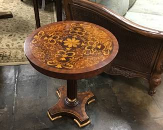 Hand carved Rosewood table by Maitland-Smith. Satinwood, marquetry, fluted pedestal column with gilt, trim and gilded feet.