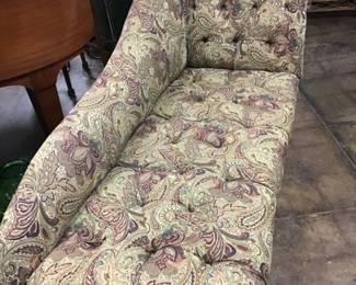 Antique Victorian chaise lounge/fainting sofa. Button tufted and reupholstered in a rich paisley pattern tapestry type material. Beautifully reimagined.