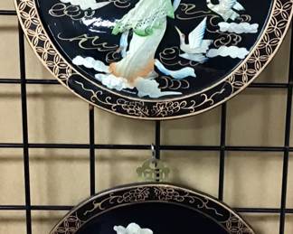 Vintage Japanese mother-of-pearl Geisha on black lacquered background. Hand painted gold design on round frame.