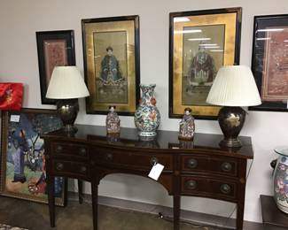Hepplewhite, Mahogany server/display cabinet. Chinese ancestral portraits, signed, handpainted on silk, high-ranking, richly dressed and elegantly framed. Brass chinoiserie ginger jar lamp with bronze finish, etched floral design.  Framed 100 children playing silk polychrome embroidery. 