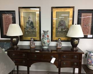 Hepplewhite, Mahogany server/display cabinet. Chinese ancestral portraits, signed, handpainted on silk, high-ranking, richly dressed and elegantly framed. Brass chinoiserie ginger jar lamp with bronze finish, etched floral design.  Framed 100 children playing silk polychrome embroidery. 