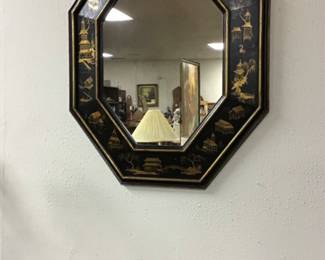 Chinoiserie black lacquered octagonal mirror. 