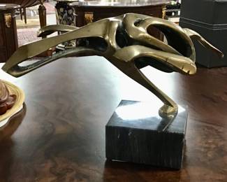 Patinated bronze cheetah by Bob Bennett. Limited addition 35/250