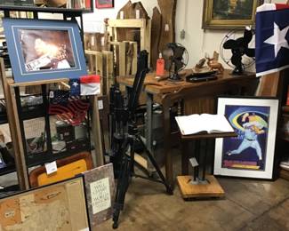 Vintage print of a young Willie Nelson with someone playing a Gibson guitar!  Orion mount binocular tripod. “ Ryan Express” Nolan Ryan offset lithograph TOPPS poster. 1993.  Rolling slant style side table handcrafted by Will Armstrong.