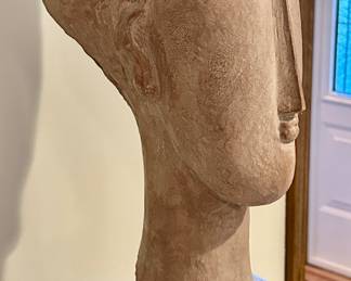 Arist: Austin Productions, after Amedeo Magdigliani. Title: Tete' de Femme, Year: 1961-1963 in Medium Terracotta. Reproduction of original impressionist and Modern Art circa 1911 by Amedeo Magdigliani in Clay. The Original Limestone Sculpture by Magdigliani was offered by Christies at $30MM - 40MM.