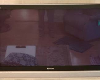 Panasonic Viera HDTV with Remote and Stand.