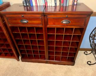 Pair of Pottery Barn Wine Bars with storage for 24 Bottles of Wine Each. Great choice for a small apartment or dining room . These are not being sold anymore by Pottery Barn...