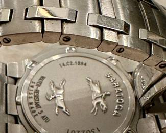 Rare Stainless Steel Men's Concord Saratoga (Model 14.C2.1894 with Black Face and Date Complication. Very collectible Swiss-Made Quartz Movement. Stainless Steel Band with deployment buckle.