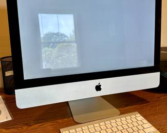 Apple iMac All in One Desktop Computer with Apple Magic Bluetooth Keyboard and Magic Mouse.