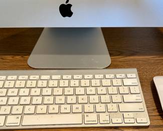 Apple iMac All in One Desktop Computer with Apple Magic Bluetooth Keyboard and Magic Mouse.