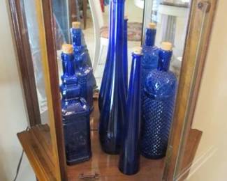 Collectible blue glass bottles