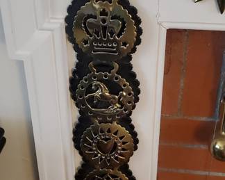 . Collection of brass horse badges