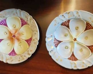 Pair of Oyster plates, with repairs