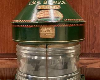 Large ship's masthead lantern (HMS Beagle) by famous British maker Meteorite. With brass maker's badge with Meteorite and serial no. C37401. Fresnel glass lens, solid brass, painted green, bezel and carry handle. 