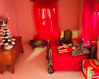 Inside View of Doll House Bedroom with Brass Bed