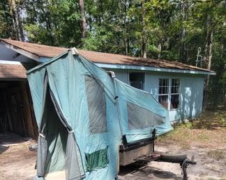 Camper to pull behind motorcycle. Used just a few times and stored closed inside a closed garage. It has an Air Conditioner! 