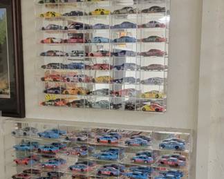 We have several acrylic display cases for different size scaled model cars too. 