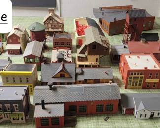 Tons of buildings that came off of a train layout.  Lots of buildings have full lighting capabilities. The factories smoke, etc.  We left wires available for easy wiring to your layout. 