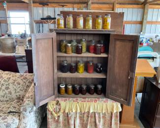 OLD CANNING GOODS.   STILL LOOKS GOOD.   PICKLES, JAMS, BEANS.   