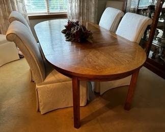 Mid-century dining table. Six upholstered dining chairs