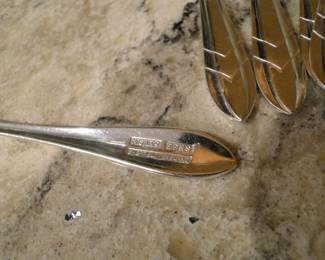 Sterling silver pieces, with mark.  6 forks and 6 spoons.