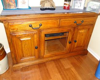 Large, solid wood entertainment center