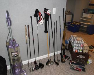 Chipper, putter, wood, and driver, along with balls too