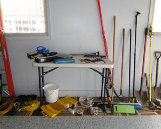 Brooms, and rakes, and yard stuff