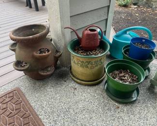 Hens and Chicks Tera Cotta Planter, Assortment of Planters and Watering Cans