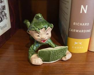 Green Ceramic Pixie Laying Down Reading Book Figurine