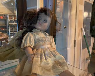 Doll with Brown Hair and Cream Colored Dress