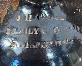 CLOSE-UP VIEW OF IMPRESSED MARK 