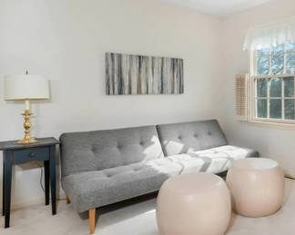 Contemporary futon & 2 faux leather ottomans