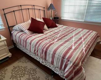 Queen bed with wrought iron frame