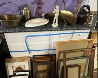 Wall pictures, frames, brass pots, sculptures, log carrier