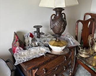 Antique side table, home decor items and lighting