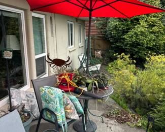 Patio table, chairs and umbrella