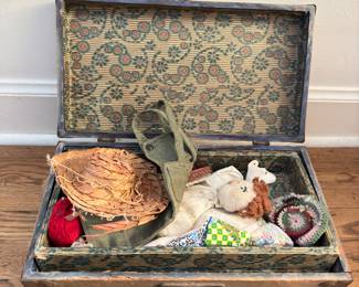 vintage box with handmade dolls and doll clothes