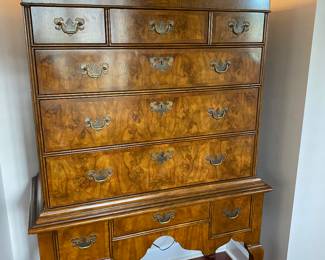 Amazing Baker highboy chest with burled walnut fronts.