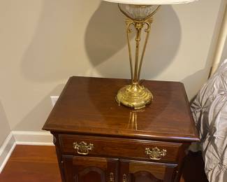 Pair of bedside tables and lamps.