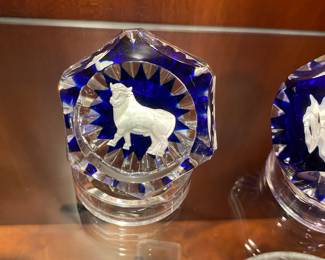 Astrology paperweights by Baccarat.